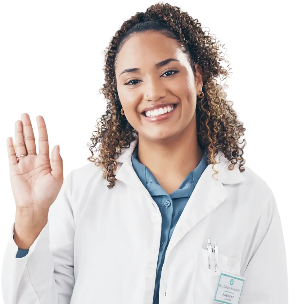 A friendly female pharmacist smiling and waving